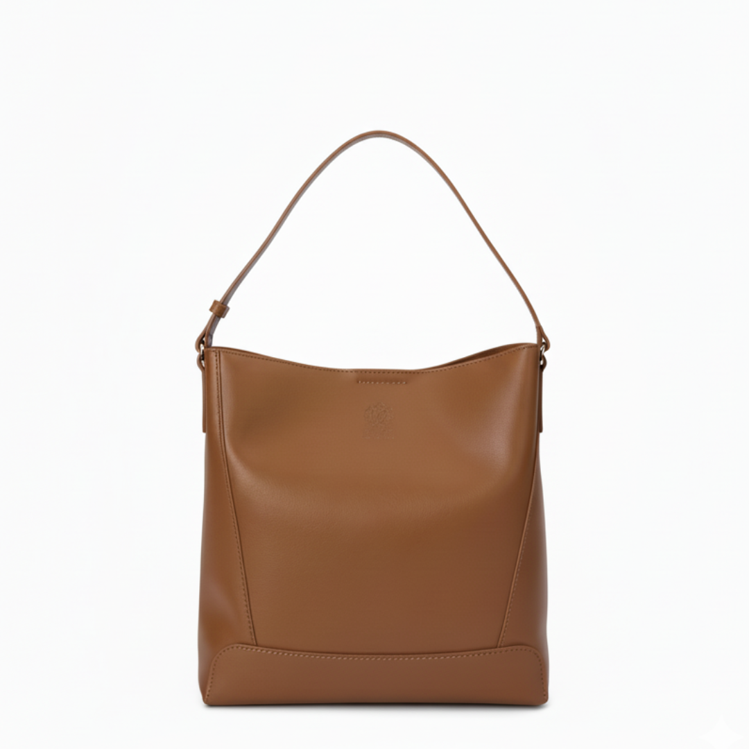 Maison Revelle La Muse du Matin minimalist leather bucket bag front view sand beige
